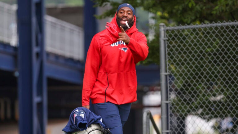 New England Patriots linebacker Matthew Judon arrives during training camp on the Gillette Stadium practice field.