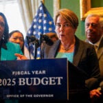 Governor Maura Healey speaks after signing the fiscal 2025 budget at the Massachusetts State House in Boston.