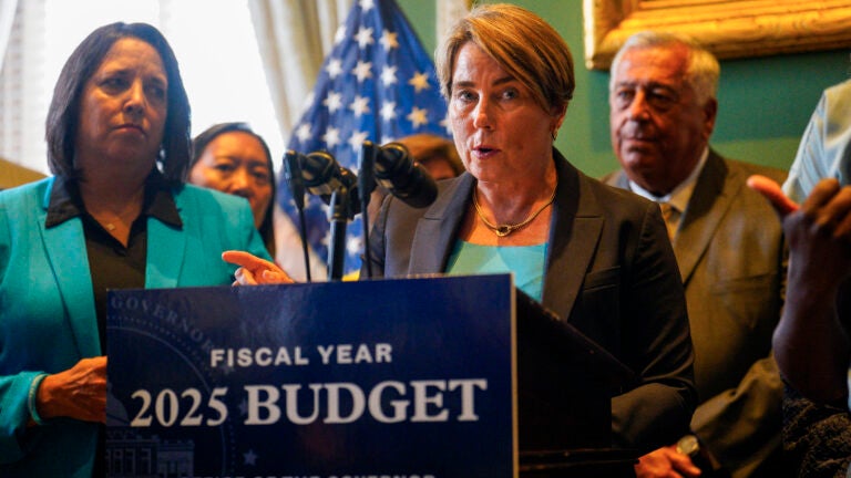 Governor Maura Healey speaks after signing the fiscal 2025 budget at the Massachusetts State House in Boston.