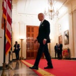 President Joe Biden walks from the podium after speaking in the Cross Hall of the White House in Washington.
