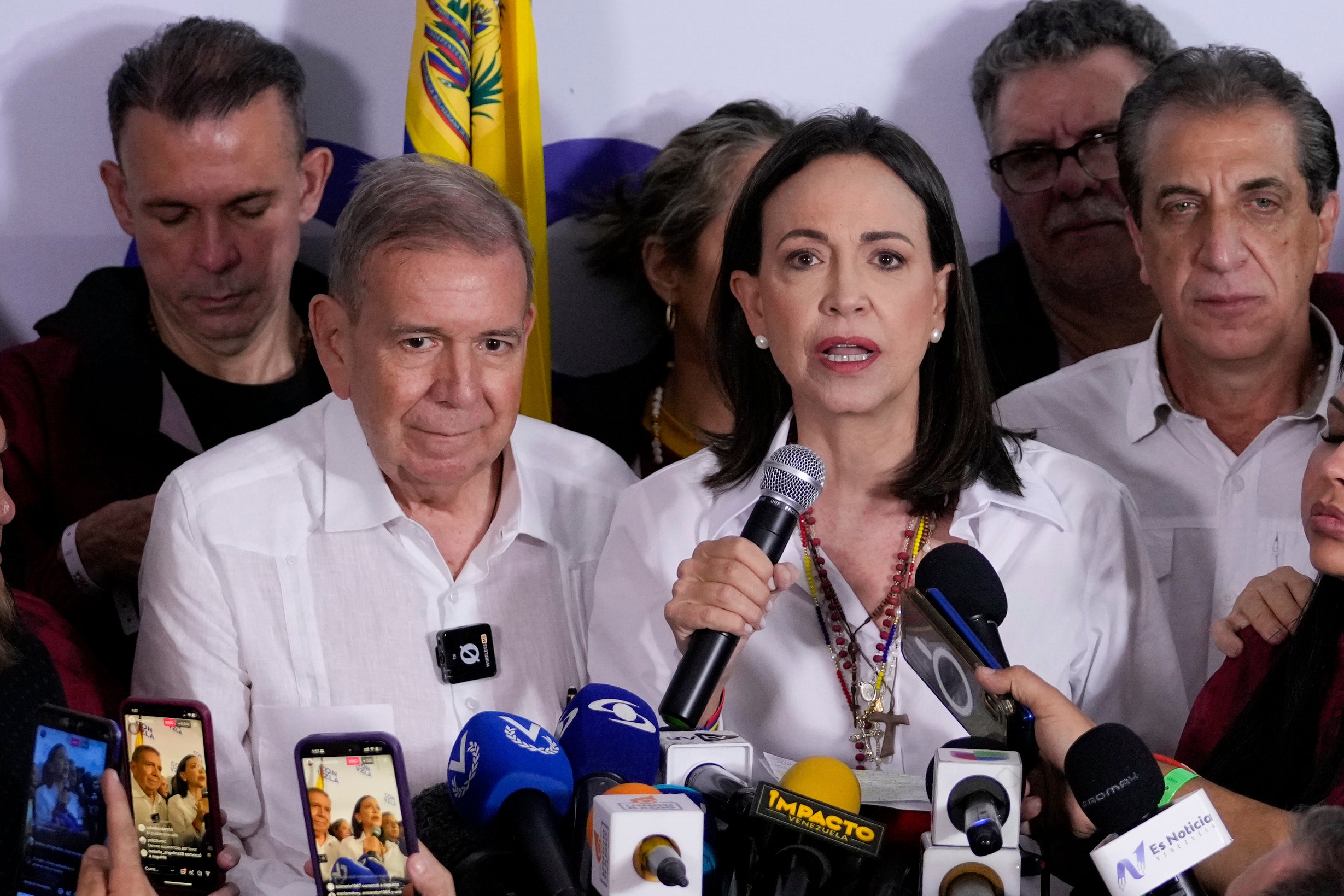 Opposition leader Maria Corina Machado, right, and presidential candidate Edmundo Gonzalez hold a press conference. 