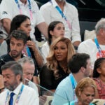 Serena Williams is seen in the stands.
