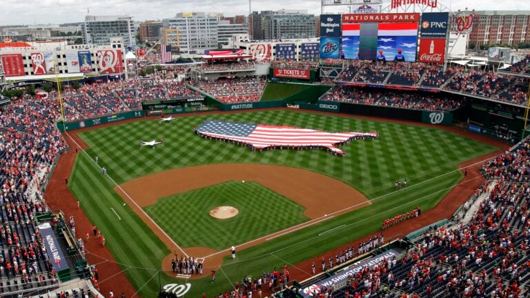 A U.S. flag, in the shape of the country, in the outfield.
