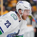 Vancouver Canucks center Elias Lindholm (23) plays against the Nashville Predators during the second period in Game 6 of an NHL hockey Stanley Cup first-round playoff series Friday, May 3, 2024, in Nashville, Tenn.