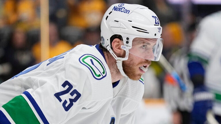 Vancouver Canucks center Elias Lindholm (23) plays against the Nashville Predators during the second period in Game 6 of an NHL hockey Stanley Cup first-round playoff series Friday, May 3, 2024, in Nashville, Tenn.