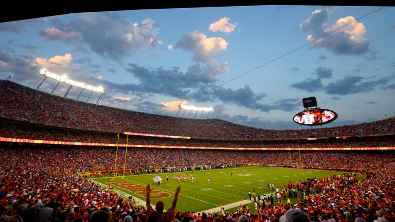 Fans cheer at Arrowhead Stadium during the first half of an NFL football game between the Kansas City Chiefs and the Detroit Lions.