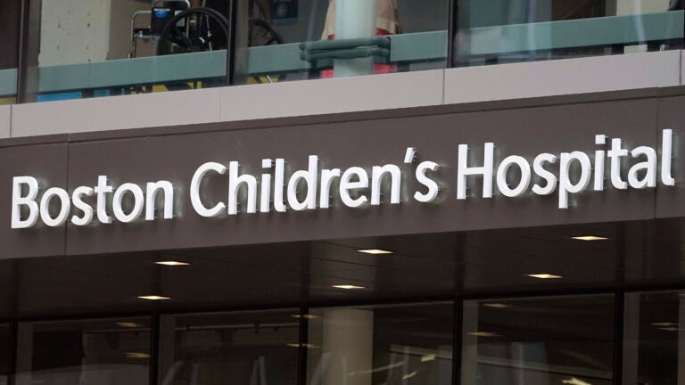 A sign hangs on the Boston Children's Hospital, Thursday, Aug. 18, 2022, in Boston.