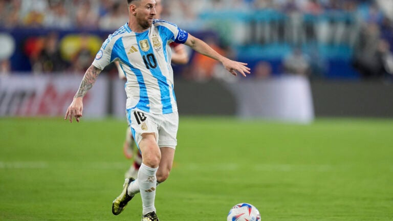 Argentina's Lionel Messi dribbles during a Copa America semifinal soccer match against Canada.