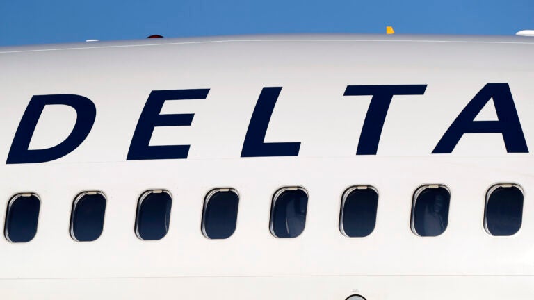 A Delta Air Lines jetliner is shown at Denver International Airport.