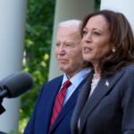 FILE - President Joe Biden listens as Vice President Kamala Harris speaks in the Rose Garden of the White House in Washington, May 13, 2024.