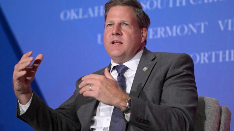 FILE - New Hampshire Gov. Chris Sununu takes part in a panel discussion, Nov. 15, 2022, in Orlando, Fla.