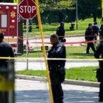 Police investigate a shooting near King Park during the second day of the 2024 Republican National Convention, Tuesday, July 16, 2024, in Milwaukee. The shooting occurred outside of the security perimeter for the Republican National Convention.
