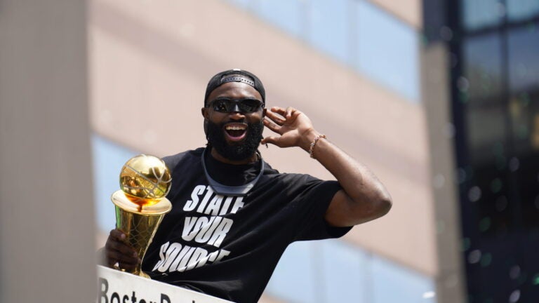 Jaylen Brown celebrates during a duck boat parade to celebrate the 18th Boston Celtics NBA championship on Friday, June 21, 2024. The Celtics defeated the Dallas Mavericks in Game 5 of the NBA Finals.