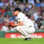 Red Sox pitcher Nick Pivetta reacts after walking in a bases loaded run against the Oakland Athletics during the third inning.