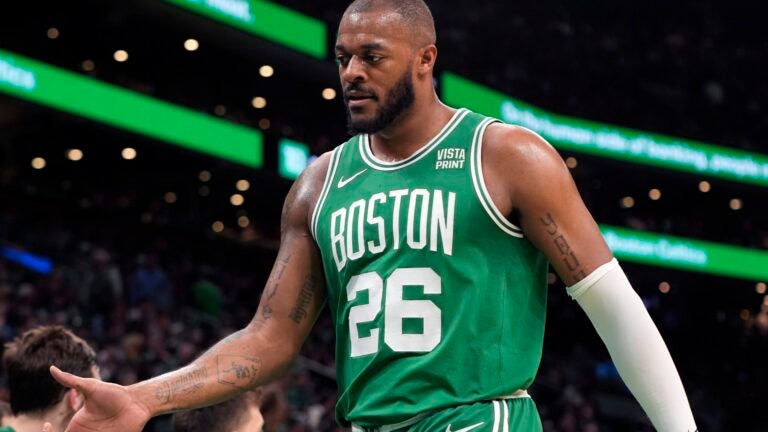 Boston Celtics' Xavier Tillman during the first half of an NBA basketball game against the Charlotte Hornets, Friday, April 12, 2024, in Boston.