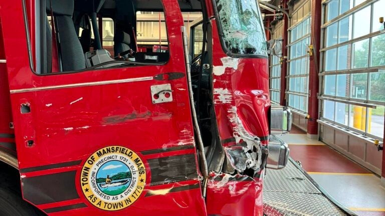 Officials: Tractor-trailer plowed into Mansfield fire truck and sped off