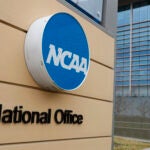 Signage at the headquarters of the NCAA is viewed in Indianapolis.