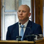 Massachusetts State Police Detective Lt. Brian Tully listens on the witness stand during the Karen Read murder trial in Norfolk Superior Court in Dedham, Mass., Wednesday, June 12, 2024.