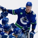 Vancouver Canucks' Nikita Zadorov is congratulated for his goal against the Edmonton Oilers during the second period of Game 2 of an NHL hockey Stanley Cup second-round playoff series, Friday, May 10, 2024, in Vancouver, British Columbia.