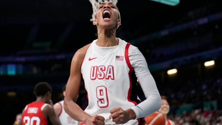 A'ja Wilson, of the Unites States, celebrates after scoring against Japan in a women's basketball game at the 2024 Summer Olympics.