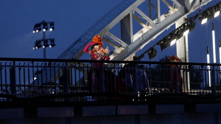 Drag queens prepare to perform on the Debilly Bridge in Paris, during the opening ceremony of the 2024 Summer Olympics.