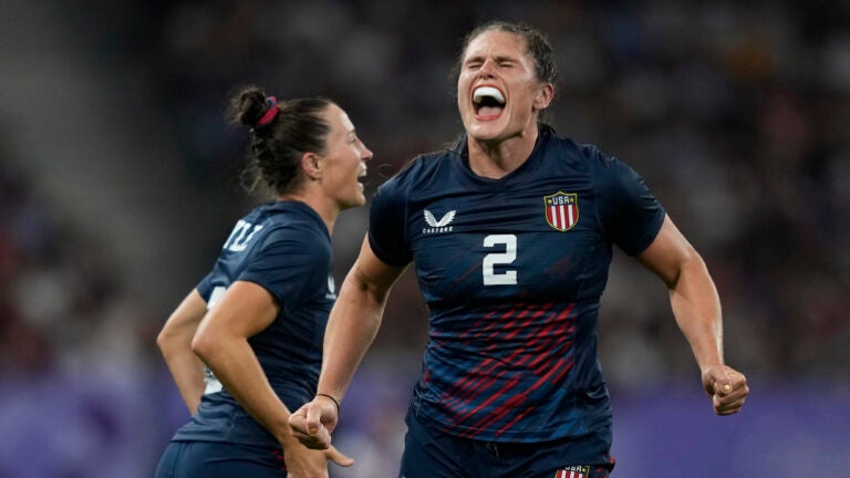 United States' Ilona Maher celebrates after winning their women's quarterfinal Rugby Sevens match between Great Britain and the United States at the 2024 Summer Olympics.