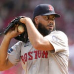 Boston Red Sox pitcher Kenley Jansen looks to throw during a baseball game against the Cincinnati Reds in Cincinnati, Sunday, June 23, 2024.