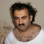 FILE - In this March 1, 2003 file photo obtained by The Associated Press, Khalid Sheikh Mohammed is seen shortly after his capture during a raid in Pakistan.