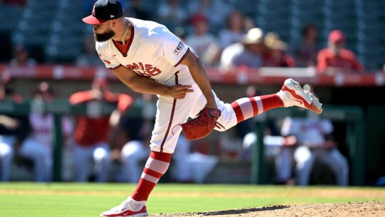 Luis Garcia, formerly of the Los Angeles Angels, earns a save in a game against the Athletics July 28. Garcia was traded Tuesday to the Red Sox.