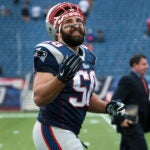 Patriots LB Rob Ninkovich smiles as he sees someone in the stands and blows them a kiss as he leaves the field following the New England victory. The New England Patriots hosted the Chicago Bears in a regular season NFL game at Gillette Stadium.