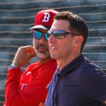 Boston Red Sox manager Alex Cora and Boston Red Sox Chief Baseball Officer Craig Breslow watch live batting practice. Boston Red Sox Spring Training.