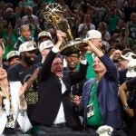 Boston Celtics owner "Wyc" K. Grousbeck who is the majority owner and governor of the National Basketball Association's Boston Celtics raised the Larry O’Brien championship trophy following the Celtics win in Game 5 of the NBA Finals. It was announced today that the Boston Celtics are up for sale. The Boston Celtics hosted the Dallas Mavericks at TD Garden on Monday, June 17, 2024.