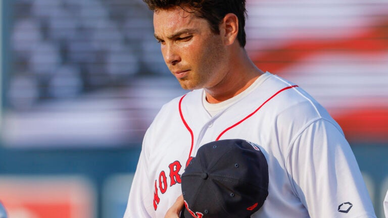 Boston Red Sox first baseman Triston Casas rehab start for the Worcester Red Sox during the playing of the National Anthem before they play the Buffalo Bison at Polar Park.