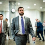 Sen. J.D. Vance (R-Ohio) walks to a vote in Washington.