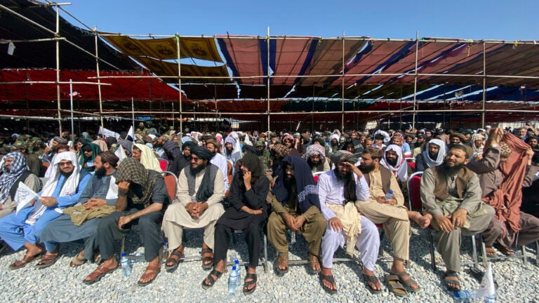 Afghans attend a ceremony to celebrate the third anniversary of the withdrawal of U.S.-led troops from Afghanistan.