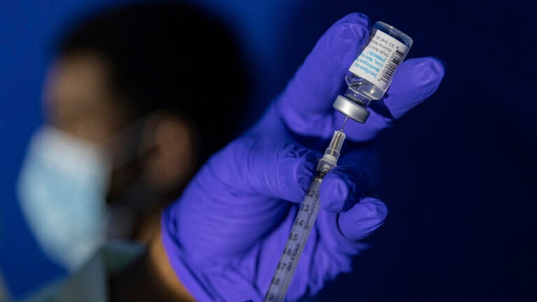 Family nurse practitioner Carol Ramsubhag-Carela prepares a syringe with the Mpox vaccine before inoculating a patient at a vaccinations site on, Aug. 30, 2022, in the Brooklyn borough of New York.