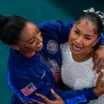 Jordan Chiles and Simone Biles celebrate after the women's artistic gymnastics individual floor finals in Bercy Arena.
