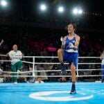 Algeria's Imane Khelif celebrates after defeating Thailand's Janjaem Suwannapheng in their women's 66 kg semifinal boxing match at the 2024 Summer Olympics.