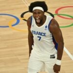 France's #07 Guerschon Yabusele celebrates after winning in the men's quarterfinal basketball match between France and Canada during the Paris 2024 Olympic Games at the Bercy Arena in Paris on August 6, 2024.