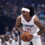 Los Angeles Clippers' Terance Mann looks to make a pass during Game 2 of an NBA basketball first-round playoff series against the Dallas Mavericks.