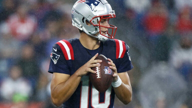 New England Patriots quarterback Drake Maye (10) looks to throw against the Carolina Panthers in the first half of a preseason game at Gillette Stadium.