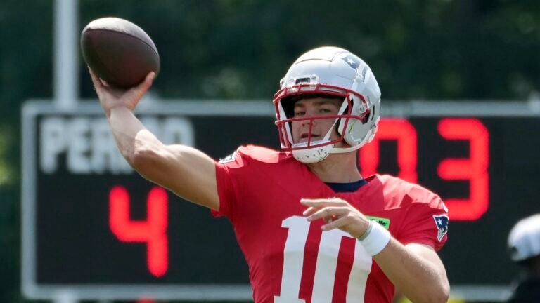 New England Patriots quarterback Drake Maye passes during a joint NFL football practice with the Philadelphia Eagles, Tuesday, Aug. 13, 2024, in Foxborough, Mass.