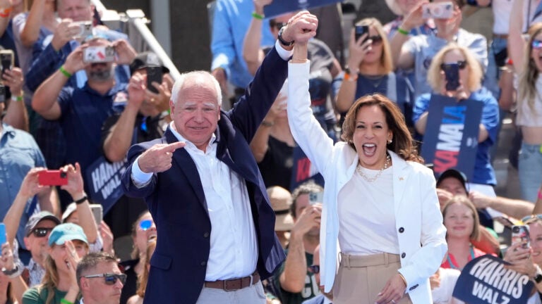 Democratic presidential nominee Vice President Kamala Harris is welcomed by Democratic vice presidential nominee Minnesota Gov. Tim Walz, before she delivers remarks at a campaign event, Wednesday, Aug. 7, 2024, in Eau Claire, Wisc.