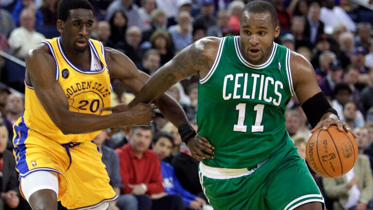 Glen Davis of the Celtics drives the ball past Golden State's Ekpe Udoh during a 2011 game in Oakland, Calif.