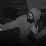 On Thursday, police arrested a 26-year-old man who was wanted in connection to an incident where a suspect looked into an occupied bathroom window in Roxbury, officials say.