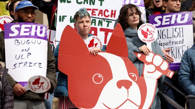 Boston University graduate worker students, pictured in March, are striking for fair pay, better healthcare coverage, and stronger benefits.