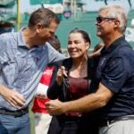 Boston Red Sox president and CEO Sam Kennedy, left, talks with Massachusetts Gov. Maura Healey, center, and John Frates, after taking the Ice Bucket Challenge during ceremonies on the fundraising event's 10th anniversary at Fenway Park, Thursday, Aug. 1, 2024, in Boston.