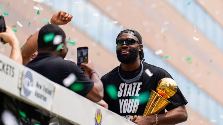 Jaylen Brown celebrates during a duck boat parade to celebrate the 18th Boston Celtics NBA championship on Friday, June 21, 2024. The Celtics defeated the Dallas Mavericks in Game 5 of the NBA Finals.