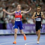 Cole Hocker, of the United States, crosses the finish line ahead of Josh Kerr, of Britain, and fourth placed Jakob Ingebrigtsen, of Norway, to win the men's 1500 meters final at the 2024 Summer Olympics.