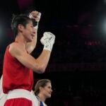 Taiwan's Lin Yu-ting celebrates after defeating Turkey's Esra Yildiz in their women's 57 kg semifinal boxing match at the 2024 Summer Olympics.
